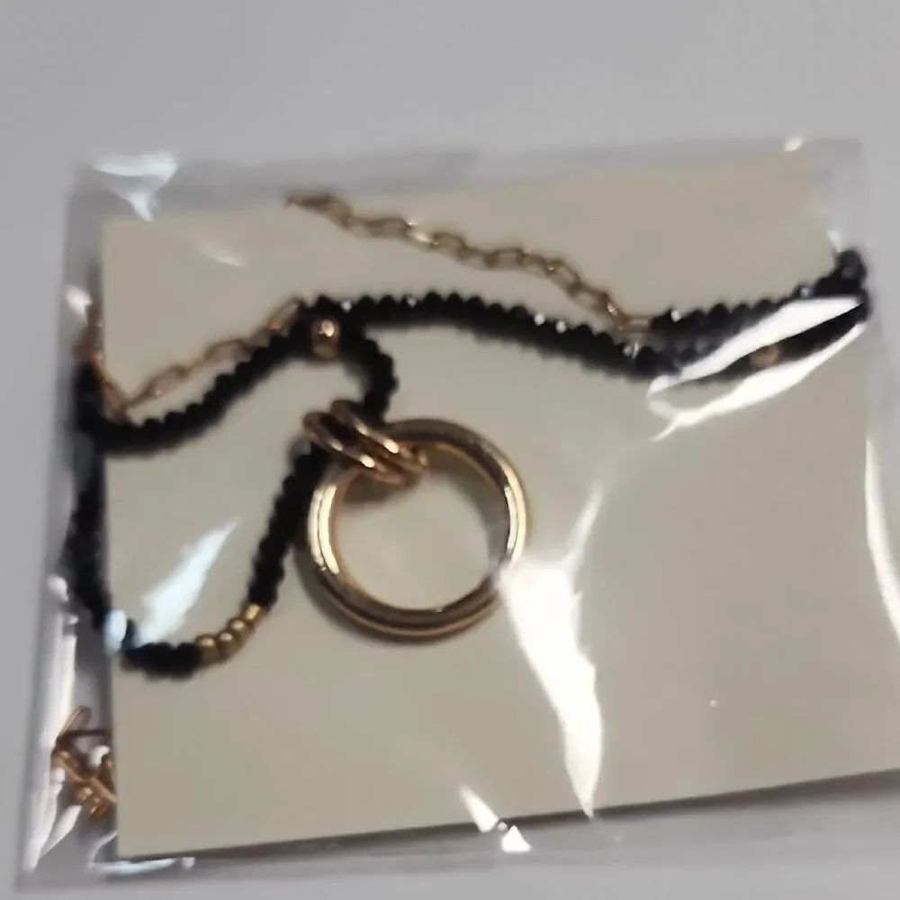 Gold and Black Necklace